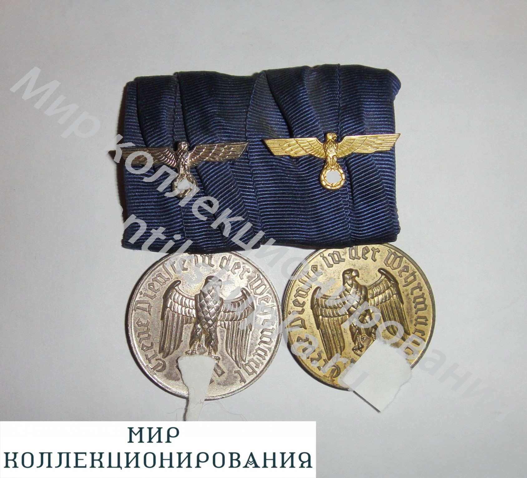 Колодка из 2 выслужных медалей в Вермахте. Колодка из 2 выслужных медалей в Вермахте.