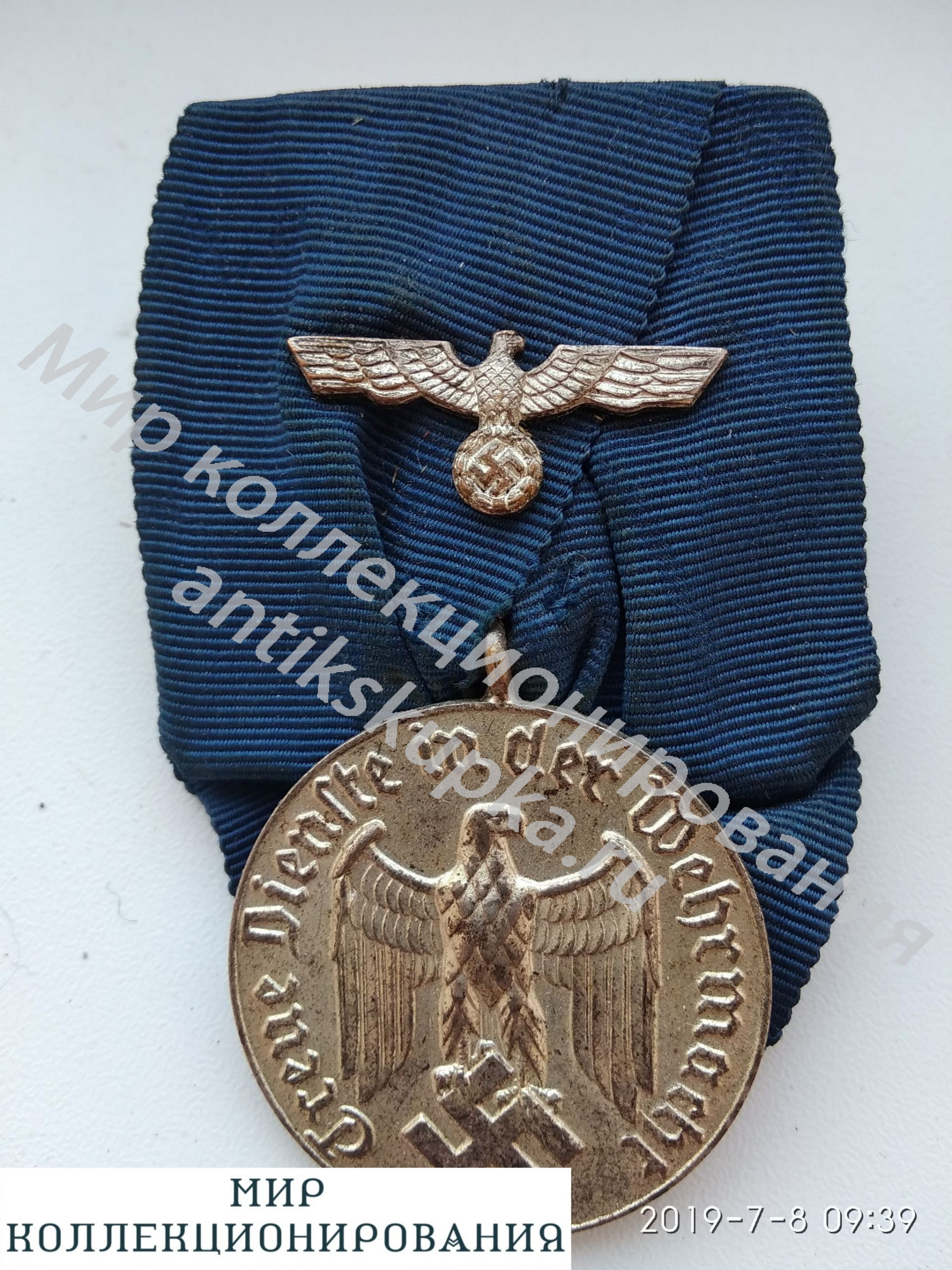Медаль 4 года выслуги на одиночной колодке с миниатюрой Heer. III Рейх. Германия Медаль 4 года выслуги на одиночной колодке с миниатюрой Heer. III Рейх. Германия